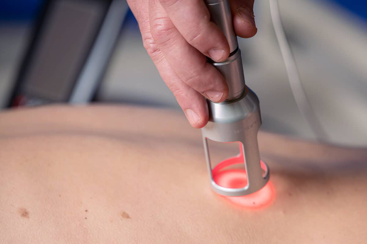Specialist Physiotherapy using a class iv laser at Calgary Core Physio